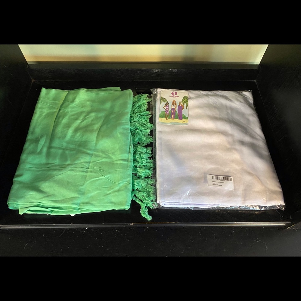 1 green, 1 white sarong